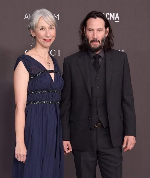 Keanu Reeves’ girlfriend, 54, faces mixed reactions after posing in teal cut-out dress on red carpet.