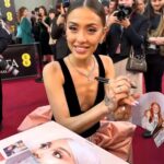 Ariana Grande signing fans pictures at the BAFTA’s – and everyone is saying the same thing