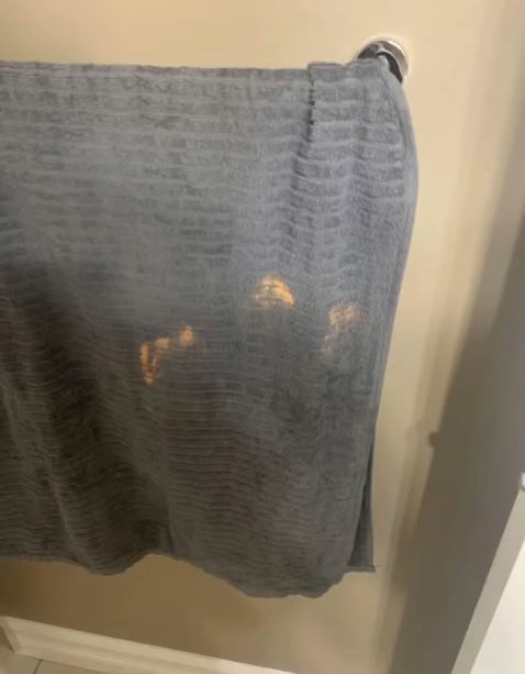 Why Those Mysterious Orange Marks Keep Showing Up on Your Towels