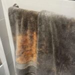 The Real Reason Orange Stains Keep Appearing on Your Towels