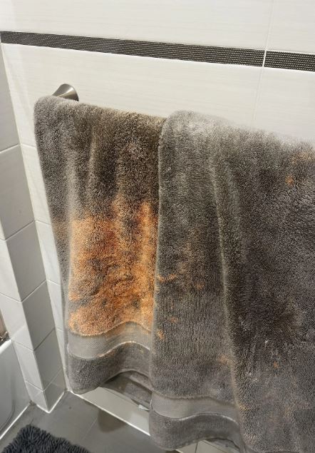 The Real Reason Orange Stains Keep Appearing on Your Towels